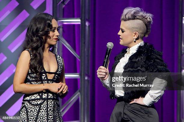 Contestant Rosy McMichael and host Kelly Osbourne speak onstage during the 4th Annual NYX FACE Awards at Club Nokia on August 22, 2015 in Los...