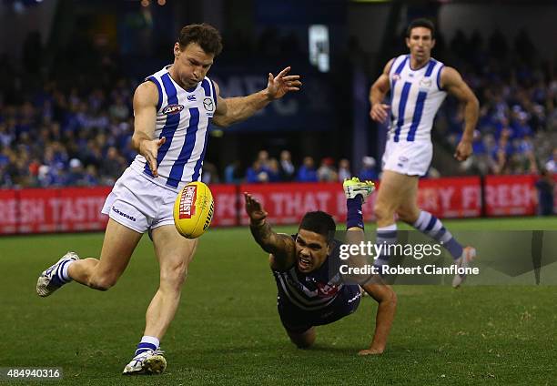 Brent Harvey of the Kangaroos kicks the ball during the round 21 AFL match between the North Melbourne Kangaroos and the Fremantle Dockers at Etihad...