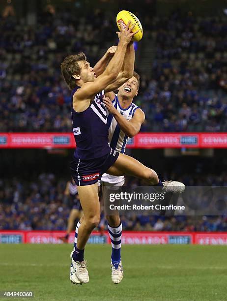 Matt De Boer of the Dockers marks the ball during the round 21 AFL match between the North Melbourne Kangaroos and the Fremantle Dockers at Etihad...