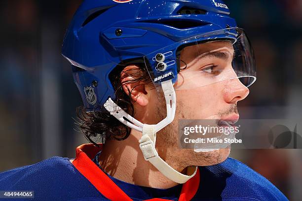 Travis Hamonic of the New York Islanders skates against the New Jersey Devils at Nassau Veterans Memorial Coliseum on March 29, 2014 in Uniondale,...