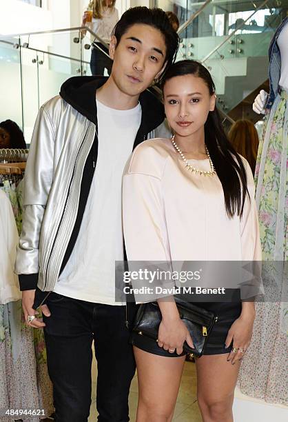 Tomo Kurata and Leah Weller attend the French Connection #CantHelpMySelfie launch party at French Connection Regent Street store on April 15, 2014 in...