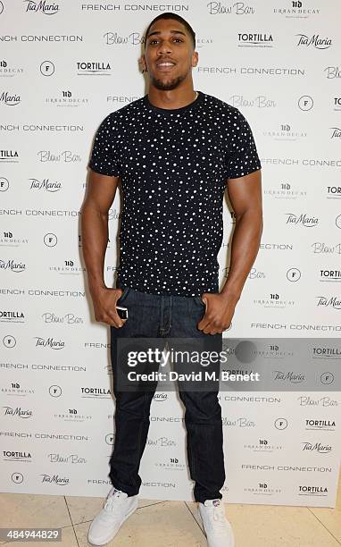 Anthony Joshua attends the French Connection #CantHelpMySelfie launch party at French Connection Regent Street store on April 15, 2014 in London,...