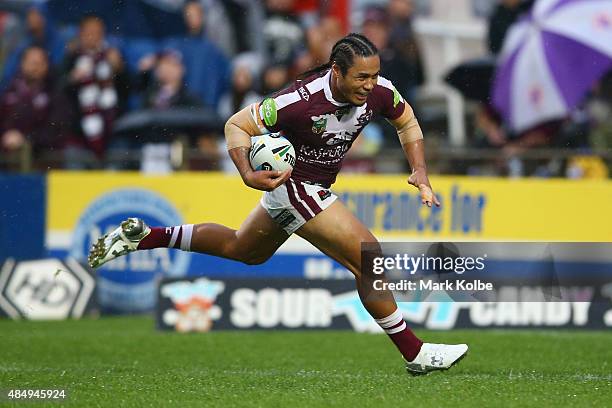 Steve Matai of the Eagles breaks away to score a try during the round 24 NRL match between the Manly Warringah Sea Eagles and the Parramatta Eels at...