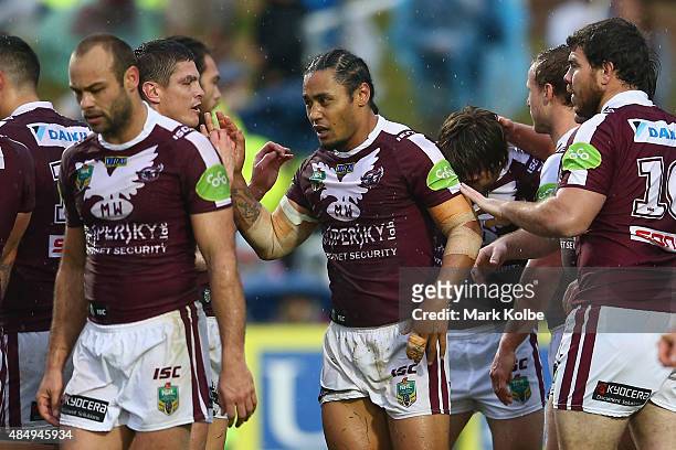 Steve Matai of the Eagles celebrates with his team mates after scoring a try during the round 24 NRL match between the Manly Warringah Sea Eagles and...