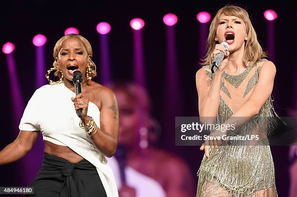 Singer-songwriters Mary J. Blige and Taylor Swift perform onstage during Taylor Swift The 1989 World Tour Live In Los Angeles at Staples Center on...