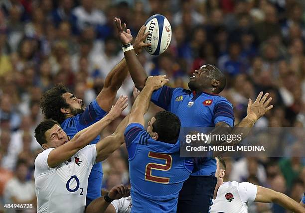 England's hooker Tom Youngs, Frances winger Yoann Huget, France's hooker Guilhem Guirado and Frances prop Eddy Ben Arous fight for the ball during a...