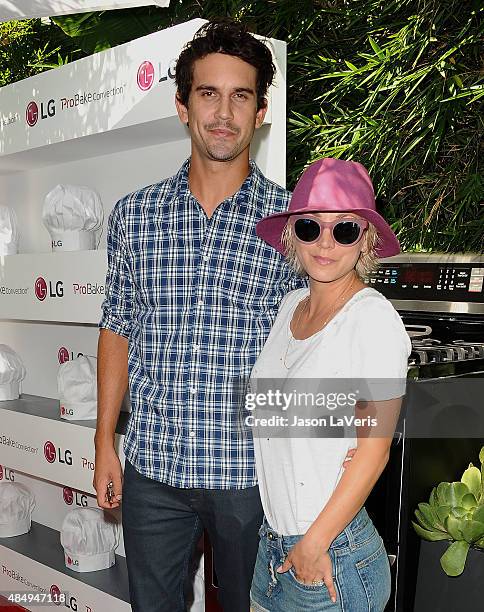 Ryan Sweeting and Kaley Cuoco attend the LG "Fam To Table" series at The Washbow on August 22, 2015 in Culver City, California.