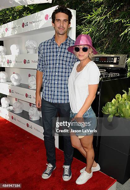 Ryan Sweeting and Kaley Cuoco attend the LG "Fam To Table" series at The Washbow on August 22, 2015 in Culver City, California.