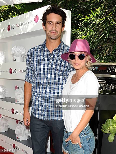 Ryan Sweeting and Kaley Cuoco attend the LG "Fam To Table" series at The Washbow on August 22, 2015 in Culver City, California.