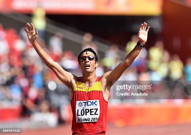 Spaniard Miguel Angel Lopez celebrates after winning the men's 20km Walk during the '15t IAAF World Athletics Championships Beijing 2015' at Beijing...