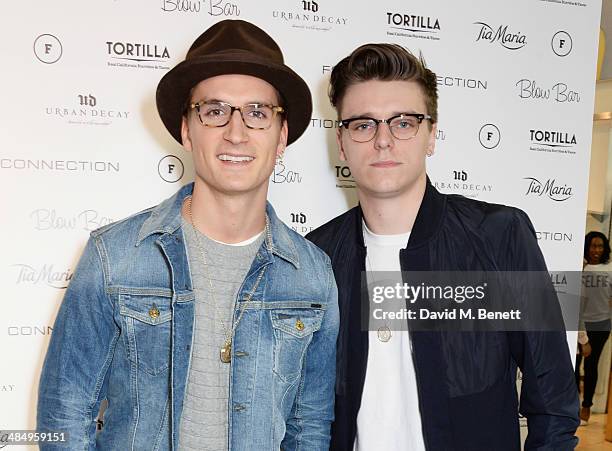 Oliver Proudlock and guest attend the French Connection #CantHelpMySelfie launch party at French Connection Regent Street store on April 15, 2014 in...