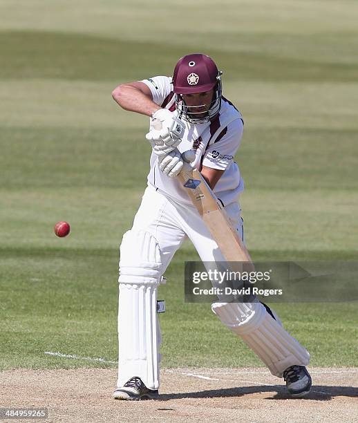 Matthew Spriegel of Northamptonshire drives the ball for four runs during the third day of the LV County Championship Division One match between...