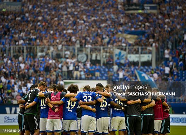 Schalke players reacts during the German first division Bundesliga football match FC Schalke 04 v SV Darmstadt 98, on August 22, 2015 in...