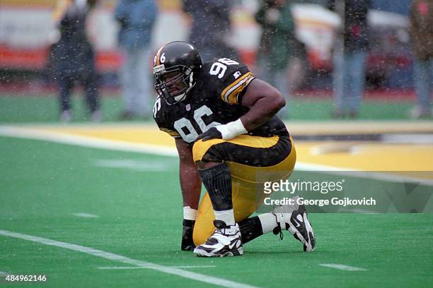 Defensive lineman Brentson Buckner of the Pittsburgh Steelers looks on from the field as snow falls during a National Football League game against...
