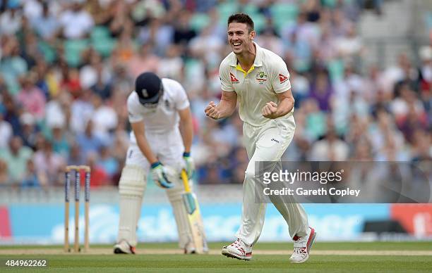 Mitchell Marsh of Australia celebrates dismissing Jos Buttler of England during day four of the 5th Investec Ashes Test match between England and...