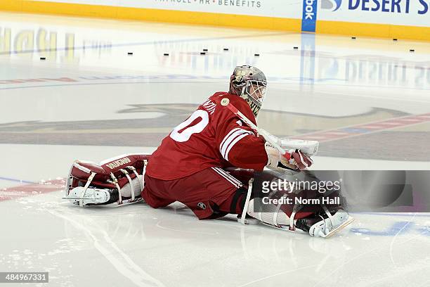 Mark Visentin of the Phoenix Coyotes warms up during pregame against the San Jose Sharks at Jobing.com Arena on April 12, 2014 in Glendale, Arizona....