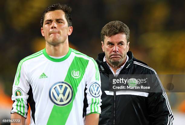 Dieter Hecking , head coach of Wolfsburg looks dejected after the the DFB Cup Semi Final match between Borussia Dortmund and VfL Wolfsburg at Signal...