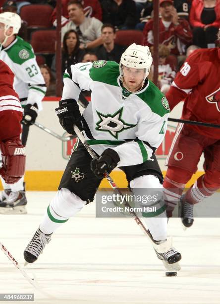 Dustin Jeffrey of the Dallas Stars skates with the puck against the Phoenix Coyotes at Jobing.com Arena on April 13, 2014 in Glendale, Arizona.