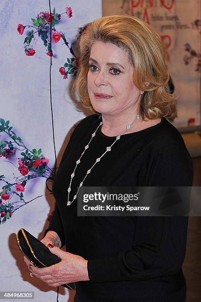 Catherine Deneuve arrives to the 'Dans La Cour' Paris Premiere at Mk2 Bibliotheque on April 15, 2014 in Paris, France.