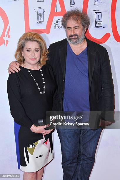 Catherine Deneuve and Gustave de Kervern attend the 'Dans La Cour' Paris Premiere at Mk2 Bibliotheque on April 15, 2014 in Paris, France.