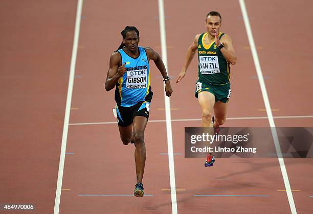 Jeffery Gibson of the Bahamas and L.J. Van Zyl of South Africa compete in the Men's 400 metres hurdles semi-final during day two of the 15th IAAF...