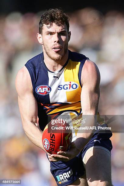 Luke Shuey of the Eagles handballs during the round 21 AFL match between the West Coast Eagles and Western Bulldogs at Domain Stadium on August 23,...