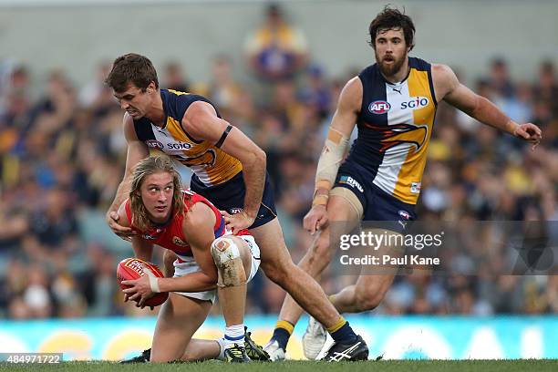 Roarke Smith of the Bulldogs looks to handball during the round 21 AFL match between the West Coast Eagles and Western Bulldogs at Domain Stadium on...