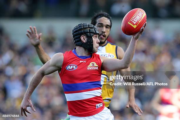 Caleb Daniel of the Bulldogs takes a one-handed mark during the round 21 AFL match between the West Coast Eagles and Western Bulldogs at Domain...