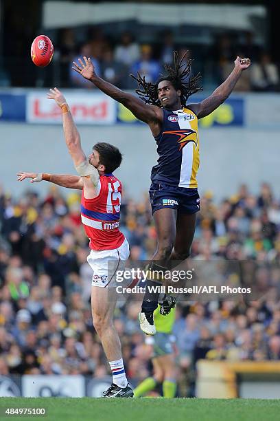 Nic Naitanui of the Eagles contests a ruck with Tom Campbell of the Bulldogs during the round 21 AFL match between the West Coast Eagles and Western...