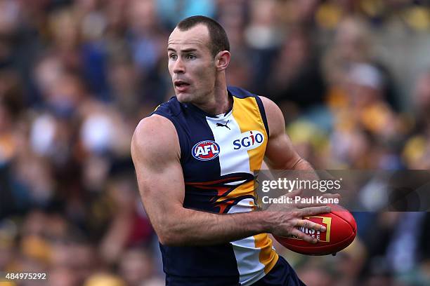 Shannon Hurn of the Eagles looks to pass the ball during the round 21 AFL match between the West Coast Eagles and Western Bulldogs at Domain Stadium...