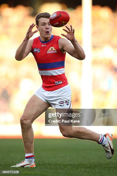 Jack Macrae of the Bulldogs gathers the ball during the round 21 AFL match between the West Coast Eagles and Western Bulldogs at Domain Stadium on...