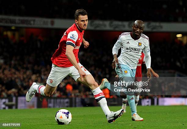 Carl Jenkinson of Arsenal Pablo Armero of West Ham during the match between Arsenal and West Ham United in the Barclays Premier League at Emirates...