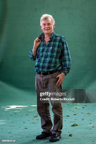 Scottish science fiction writer Ken MacLeod attends a photocall at Edinburgh International Book Festival on August 23, 2015 in Edinburgh, Scotland.