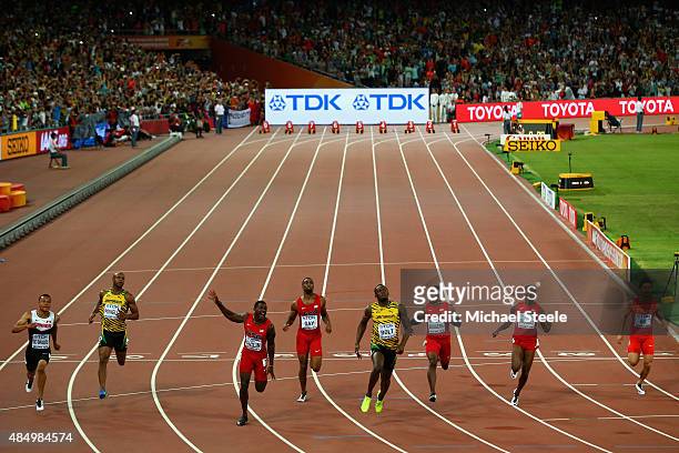 Usain Bolt of Jamaica wins gold ahead of Andre De Grasse of Canada, Asafa Powell of Jamaica, Justin Gatlin of the United States, Tyson Gay of the...