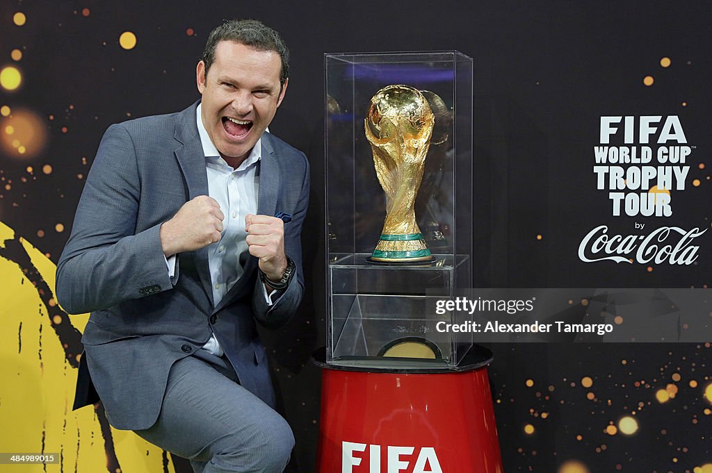 Univision Talent Poses With FIFA World Cup Trophy