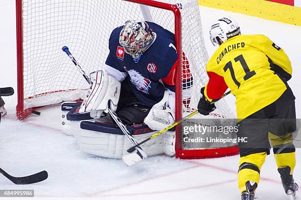 Bern's Cory Conacher scores during the Champions Hockey League group stage game between Linkoping HC and SC Bern on August 23, 2015 in Linkoping,...