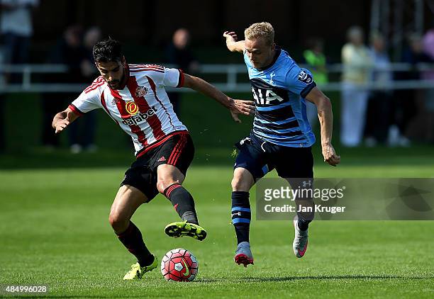 Alex Pritchard of Spurs battles with Jordi Gomez of Sunderland during the Barclays U21 Premier League match between Sunderland U21 and Tottenham...