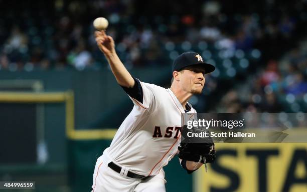 Lucas Harrell of the Houston Astros throws a pitch in the first inning against the Kansas City Royals at Minute Maid Park on April 15, 2014 in...