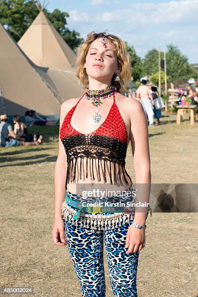 Out of the Ordinary festival stall holder Alexandra Duran wears Out of the Ordinary trousers and top, Scout Bumbag and jewellery from India on day 3...