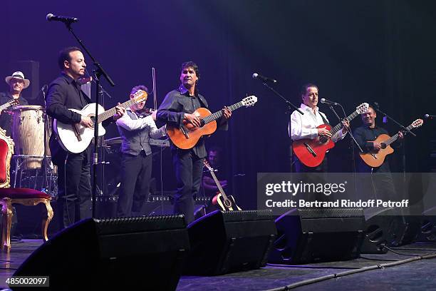 Members of 'Chico & The Gypsies' : Kema , Mounin, Chico and Kassaka perform whyle their Concert with 50 gypsy guitars at L'Olympia on April 14, 2014...