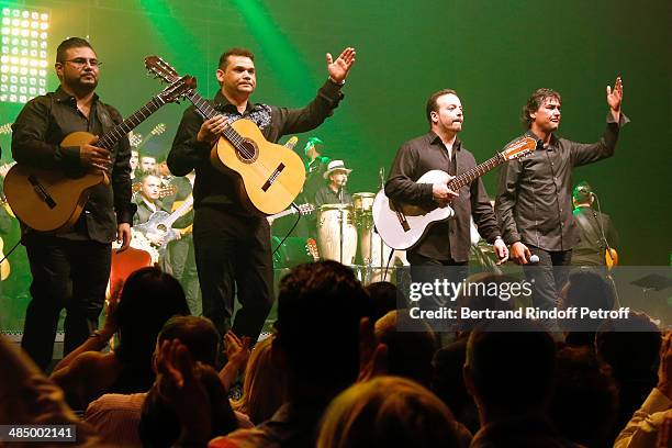 Members of 'Chico & The Gypsies' : Babato, Joseph, Kema and Mounin perform whyle their Concert with 50 gypsy guitars at L'Olympia on April 14, 2014...