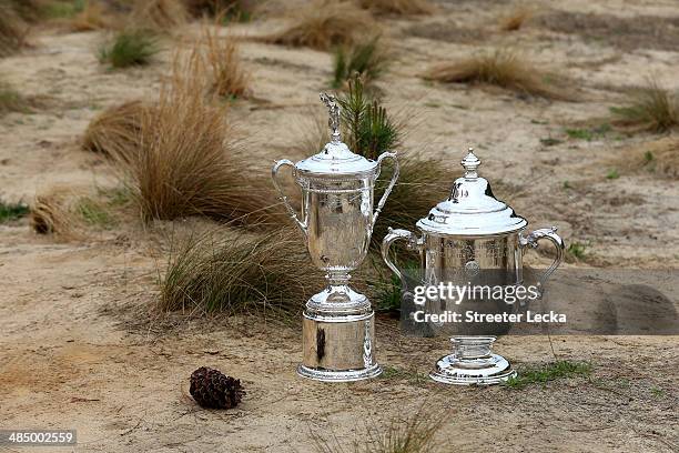 General view of the Men's and Women's U.S. Open trophies during the 2014 U.S. Open Preview Day at Pinehurst No. 2 on April 14, 2014 in Pinehurst,...