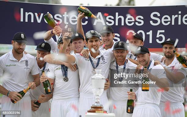 Alastair Cook and his England team celebrate winning the ashes after day four of the 5th Investec Ashes Test match between England and Australia at...