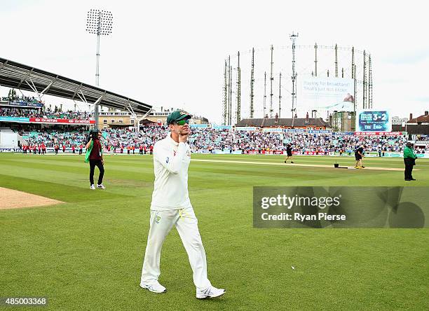 Michael Clarke of Australia walks from the ground after his last test match during day four of the 5th Investec Ashes Test match between England and...