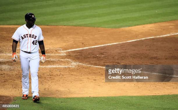 Chris Carter of the Houston Astros strikes out in the ninth inning against the Kansas City Royals at Minute Maid Park on April 15, 2014 in Houston,...