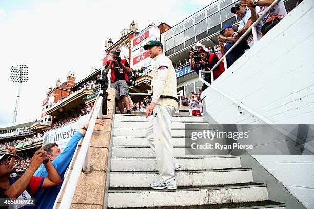 Michael Clarke of Australia walks from the ground after his last test match during day four of the 5th Investec Ashes Test match between England and...