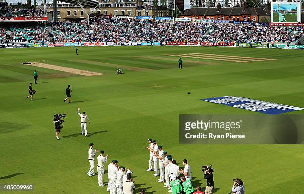 Michael Clarke of Australia walks from the ground after his last test match during day four of the 5th Investec Ashes Test match between England and...