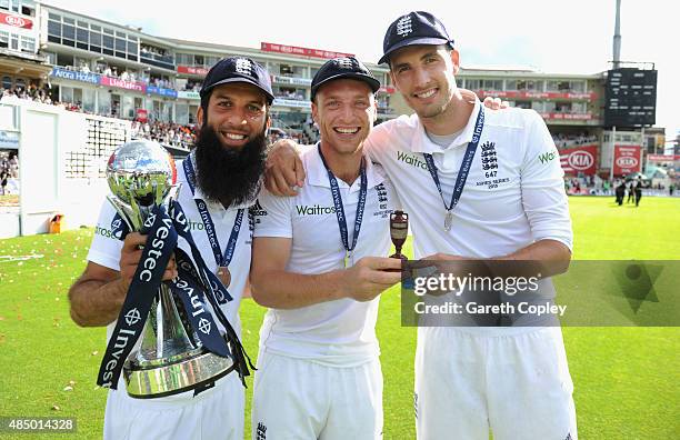 England players from left to right, Moeen Ali, Jos Buttler and Steven Finn celebrate winning the ashes after day four of the 5th Investec Ashes Test...