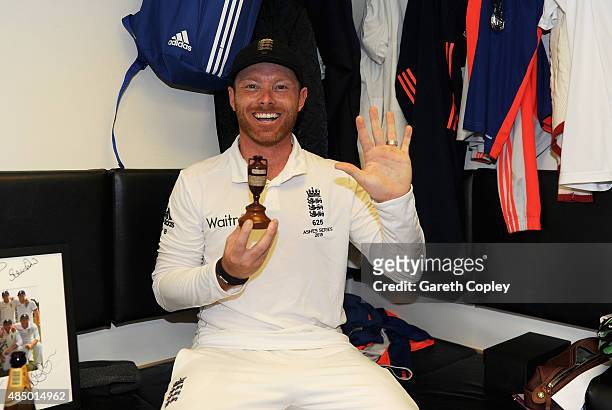 Ian Bell of England celebrates with the ashes urn in the dressing rooms after the 5th Investec Ashes Test match between England and Australia at The...