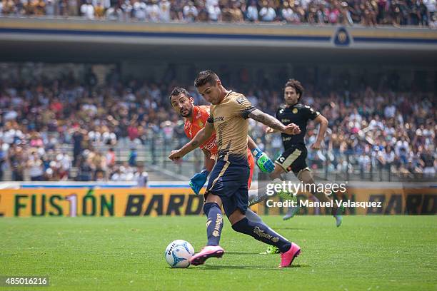 Luis Michel goalkeeper of Dorados struggles for the ball with Ismael Sosa of Pumas during a 6th round match between Pumas UNAM and Dorados de Sinaloa...